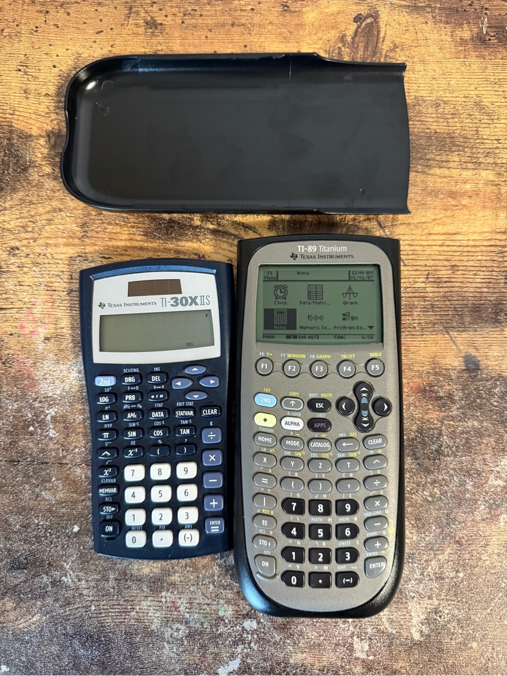 Texas Instruments TI-89 Titanium Graphing Calculator and TI 30X IIS SET OF 2